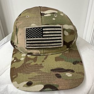 Camouflage American Flag SnapBack hat. Never worn